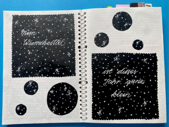 Sternenhimmel in Schwarz weiss als Illustration bzw gezeichnete Collage in einem selbst gestalteten aufgeschlagenen Kalender